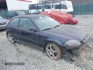 1998 Honda Civic DX with VIN 2HGEJ6342WH116620, listed as a IAAI auction lot 41934235 with 124,008 mi miles. Bid and sale history available at carsss.com. Image 1.