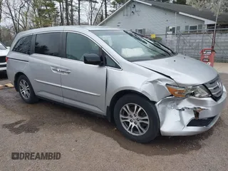 2011 Honda Odyssey EX with VIN 5FNRL5H42BB021018, listed as a IAAI auction lot 42044513 with 189,493 mi miles and . Bid and sale history available at carsss.com. Image 1.