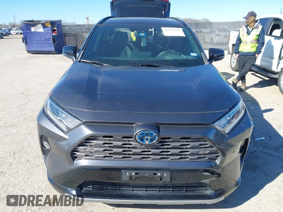 2021 Toyota RAV4 Hybrid XSE with VIN 4T3E6RFV5MU057078, listed as a IAAI auction lot 41718381 with 65,797 mi miles. Bid and sale history available at carsss.com. Image 12.