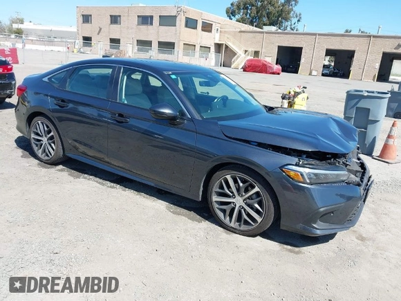 2023 Honda Civic Sedan Touring with VIN 2HGFE1F91PH310656, listed as a IAAI auction lot 41884334 with 17,691 mi miles. Bid and sale history available at carsss.com. Image 1.