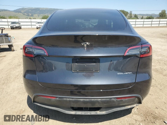2024 Tesla Model Y Performance z VIN 7SAYGDEF0RF024089, wystawiony jako Copart lot #53981865 z przebiegiem Nie podano mil oraz Szkoda całkowita • Salvage title. Historia ofert i sprzedaży dostępna na DreamBid. Obrazek 6.