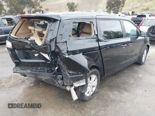 2015 Kia Sedona LX with VIN KNDMB5C14F6051455, listed as a IAAI auction lot 41991513 with 154,967 mi miles and . Bid and sale history available at DreamBid. Image 4.