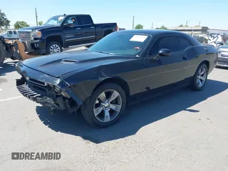 2016 Dodge Challenger SXT Plus z VIN 2C3CDZAG4GH184435, wystawiony jako IAAI lot #42162973 z przebiegiem 168 495 mil mil oraz . Historia ofert i sprzedaży dostępna na DreamBid. Obrazek 2.