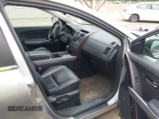 2012 Mazda CX-9 Grand Touring z VIN JM3TB3DA0C0337713, wystawiony jako IAAI lot #42368488 z przebiegiem 184 220 mil mil oraz . Historia ofert i sprzedaży dostępna na DreamBid. Obrazek 5.