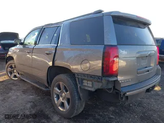2019 Chevrolet Tahoe LT with VIN 1GNSCBKC8KR123828, listed as a IAAI auction lot 41256573 with 125,618 mi miles. Bid and sale history available at carsss.com. Image 3.