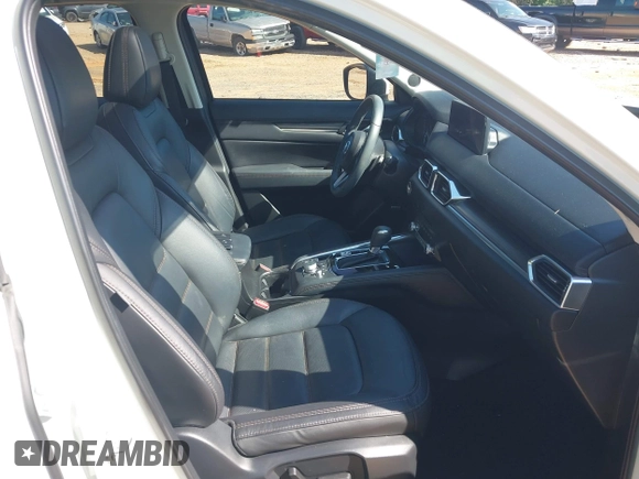 2021 Mazda CX-5 Grand Touring with VIN JM3KFBDM3M0493752, listed as a IAAI auction lot 42456854 with 35,122 mi miles and . Bid and sale history available at DreamBid. Image 5.