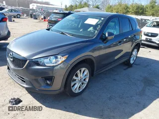 2014 Mazda CX-5 Grand Touring with VIN JM3KE4DY4E0320695, listed as a IAAI auction lot 41989350 with 169,391 mi miles and . Bid and sale history available at DreamBid. Image 18.