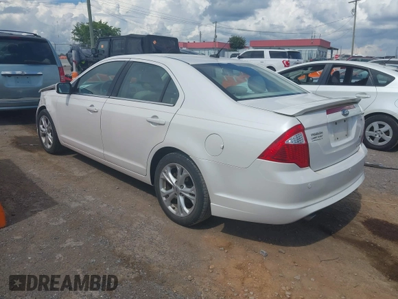 2012 Ford Fusion SE with VIN 3FAHP0HG8CR160797, listed as a IAAI auction lot 42619480 with 106,511 mi miles and . Bid and sale history available at DreamBid. Image 3.