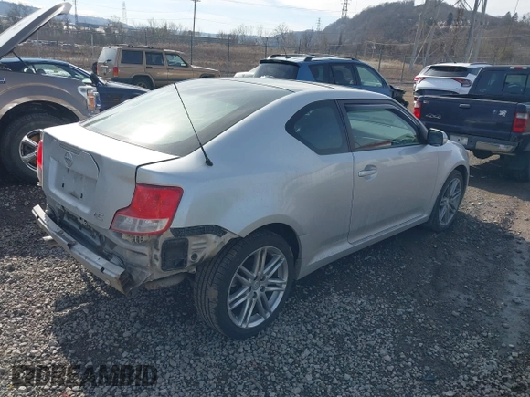 2012 Scion tC z VIN JTKJF5C73C3041811, wystawiony jako IAAI lot #41649126 z przebiegiem 188 685 mil mil oraz . Historia ofert i sprzedaży dostępna na DreamBid. Obrazek 4.