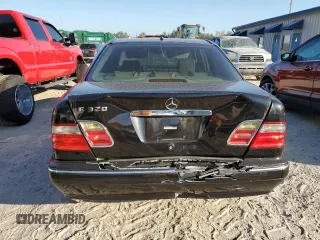2002 Mercedes-Benz E-Class with VIN WDBJF65J32B494321, listed as a Copart auction lot 77557334 with 198,820 mi miles and Salvage Title. Bid and sale history available at carsss.com. Image 6.