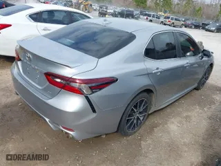 2021 Toyota Camry SE Nightshade with VIN 4T1G11AK2MU559612, listed as a IAAI auction lot 41596782 with 90,956 mi miles. Bid and sale history available at carsss.com. Image 4.