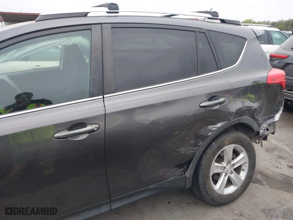 2013 Toyota RAV4 XLE with VIN 2T3WFREV3DW061989, listed as a IAAI auction lot 40766211 with 202,302 mi miles. Bid and sale history available at carsss.com. Image 6.