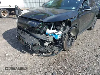 2024 Lexus RX 350 z VIN 2T2BAMCA6RC079450, wystawiony jako IAAI lot #41781873 z przebiegiem 6749 mil mil oraz . Historia ofert i sprzedaży dostępna na DreamBid. Obrazek 6.