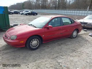 1998 Ford Taurus SE Comfort with VIN 1FAFP53S2WA255080, listed as a IAAI auction lot 41541015 with 196,604 mi miles. Bid and sale history available at carsss.com. Image 2.