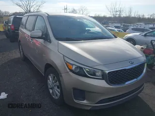 2015 Kia Sedona LX with VIN KNDMB5C15F6044093, listed as a IAAI auction lot 41843977 with 169,157 mi miles. Bid and sale history available at carsss.com. Image 1.