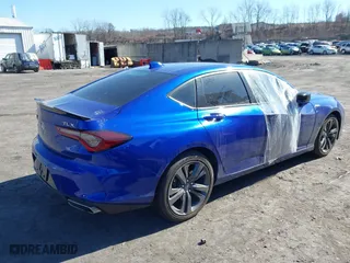 2022 Acura TLX w/A-Spec Package with VIN 19UUB5F54NA005992, listed as a IAAI auction lot 41709228 with 22,134 mi miles. Bid and sale history available at carsss.com. Image 4.