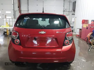 2013 Chevrolet Sonic LT with VIN 1G1JC6SH1D4116946, listed as a IAAI auction lot 41562425 with 116,815 mi miles. Bid and sale history available at carsss.com. Image 16.