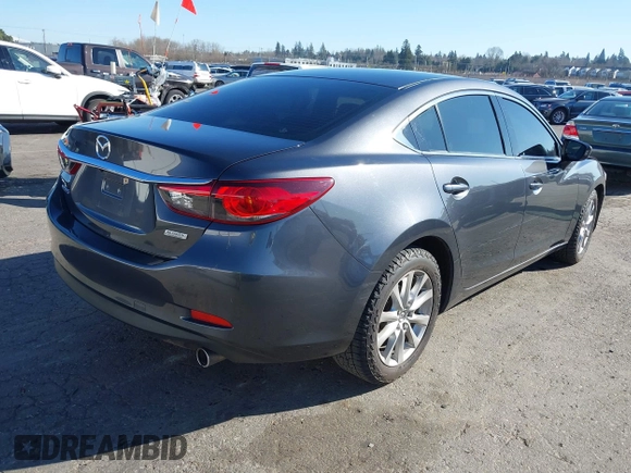 2016 Mazda 6 i Sport with VIN JM1GJ1U53G1400940, listed as a IAAI auction lot 41687400 with 77,737 mi miles and . Bid and sale history available at DreamBid. Image 4.