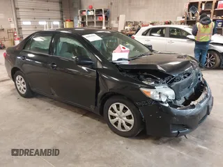 2009 Toyota Corolla with VIN 1NXBU40E29Z133733, listed as a IAAI auction lot 42093904 with 229,509 mi miles. Bid and sale history available at carsss.com. Image 1.
