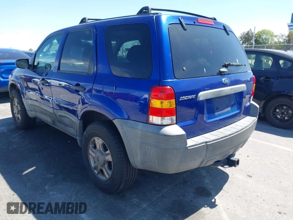 2005 Ford Escape XLS Value with VIN 1FMYU02Z85KD90338, listed as a IAAI auction lot 41916569 with 174,870 mi miles. Bid and sale history available at carsss.com. Image 3.