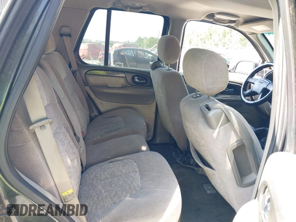 2004 GMC Envoy SLE with VIN 1GKDS13S342117178, listed as a IAAI auction lot 42164611 with 181,287 mi miles and . Bid and sale history available at DreamBid. Image 8.