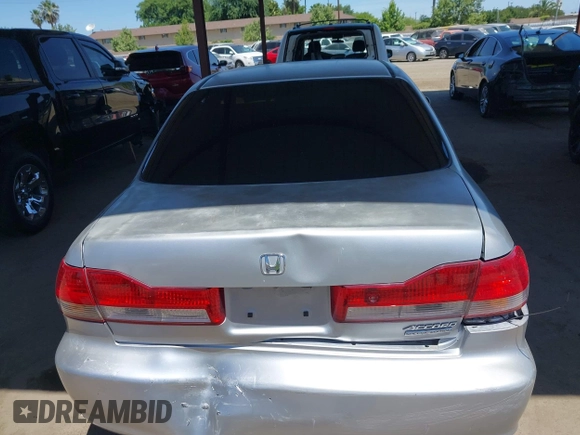 2002 Honda Accord SE z VIN JHMCG66892C011913, wystawiony jako IAAI lot #42323509 z przebiegiem 226 288 mil mil oraz . Historia ofert i sprzedaży dostępna na DreamBid. Obrazek 16.