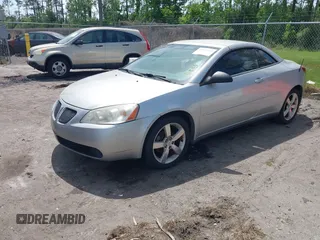 2006 Pontiac G6 GT with VIN 1G2ZH358364273262, listed as a IAAI auction lot 41963147 with 128,440 mi miles and . Bid and sale history available at DreamBid. Image 2.