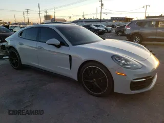 2021 Porsche Panamera с VIN WP0AJ2A73ML117455, выставлен на аукционе Copart как лот 76828823 с пробегом 54 543 миль миль и . История ставок и продаж доступна на DreamBid. Изображение 4.