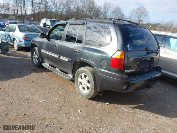 2004 GMC Envoy SLE with VIN 1GKDT13S242130520, listed as a IAAI auction lot 41503717 with 167,426 mi miles. Bid and sale history available at carsss.com. Image 3.