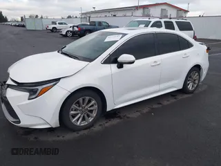 2023 Toyota Corolla Hybrid LE with VIN JTDBCMFE8PJ010659, listed as a IAAI auction lot 41772192 with 33,644 mi miles. Bid and sale history available at carsss.com. Image 18.
