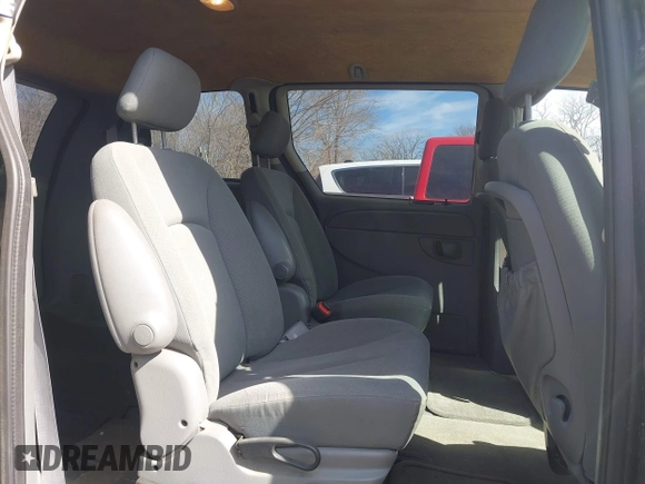 2007 Dodge Caravan SXT with VIN 1D4GP45R57B237884, listed as a IAAI auction lot 41660880 with 120,513 mi miles and . Bid and sale history available at DreamBid. Image 8.