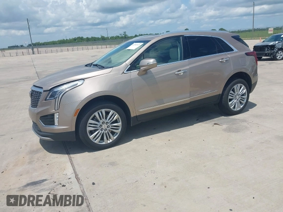 2022 Cadillac XT5 AWD Premium Luxury with VIN 1GYKNDRSXNZ112680, listed as a IAAI auction lot 42389521 with 12,365 mi miles and . Bid and sale history available at DreamBid. Image 2.