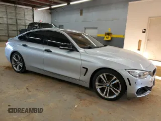 2015 BMW 4 Series 428i z VIN WBA4A5C51FG052009, wystawiony jako Copart lot #89110235 z przebiegiem 156 675 mil mil oraz Szkoda całkowita • Salvage title. Historia ofert i sprzedaży dostępna na DreamBid. Obrazek 4.