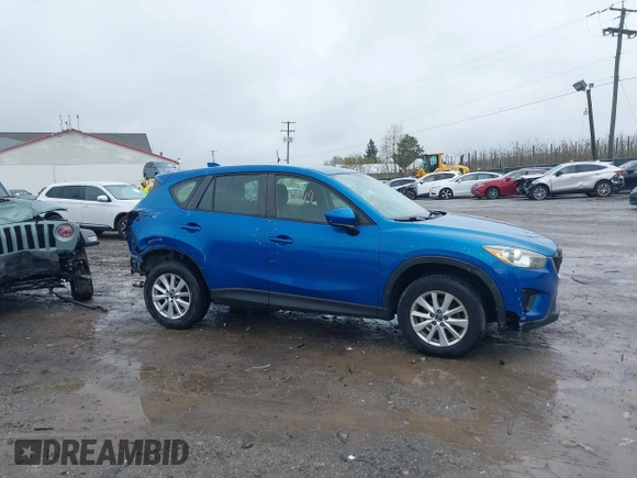 2014 Mazda CX-5 Sport with VIN JM3KE4BE6E0336504, listed as a IAAI auction lot 41961244 with 125,150 mi miles. Bid and sale history available at carsss.com. Image 14.