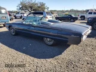 1965 Ford Thunderbird with VIN 5Y85Z115781, listed as a Copart auction lot 82289124 with 75,677 mi miles and Salvage Title. Bid and sale history available at DreamBid. Image 2.