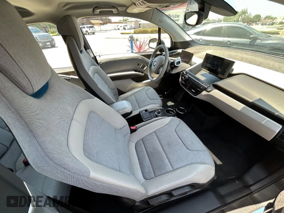 2014 BMW i3 with VIN WBY1Z4C51EV274633, listed as a Copart auction lot 64677185 with 61,664 mi miles and Clean title. Bid and sale history available at DreamBid. Image 5.