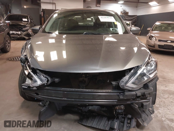 2019 Nissan Sentra S z VIN 3N1AB7AP3KY368736, wystawiony jako IAAI lot #42283123 z przebiegiem 89 117 mil mil oraz . Historia ofert i sprzedaży dostępna na DreamBid. Obrazek 13.