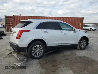 2018 Cadillac XT5 Luxury FWD with VIN 1GYKNCRS8JZ182473, listed as a Copart auction lot 60338405 with 76,595 mi miles and Salvage title. Bid and sale history available at DreamBid. Image 3.