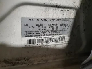2007 Mazda 3 i Touring with VIN JM1BK32G971669774, listed as a Copart auction lot 51619175 with 136,198 mi miles and Salvage Title. Bid and sale history available at DreamBid. Image 12.
