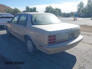 1993 Oldsmobile Cutlass Ciera S with VIN 1G3AG55N6P6421424, listed as a IAAI auction lot 41341670 with 221,301 mi miles and . Bid and sale history available at DreamBid. Image 3.
