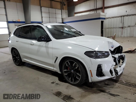 2023 BMW X3 M40i with VIN 5UX83DP00P9S39432, listed as a Copart auction lot 82797514 with Not Provided miles and Salvage Title. Bid and sale history available at DreamBid. Image 4.