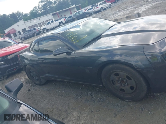 2013 Chevrolet Camaro LS z VIN 2G1FA1E39D9206888, wystawiony jako IAAI lot #42170703 z przebiegiem 169 661 mil mil oraz . Historia ofert i sprzedaży dostępna na DreamBid. Obrazek 14.