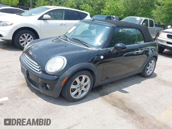 2010 MINI Convertible z VIN WMWMR3C51ATU97251, wystawiony jako IAAI lot #42408143 z przebiegiem 117 315 mil mil oraz . Historia ofert i sprzedaży dostępna na DreamBid. Obrazek 2.