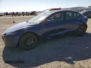 2025 Tesla Model 3 Long Range z VIN 5YJ3E1EA6SF935839, wystawiony jako Copart lot #57665785 z przebiegiem 5 996 mil mil oraz Szkoda całkowita • Salvage title. Historia ofert i sprzedaży dostępna na DreamBid. Obrazek 1.