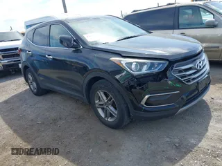 2017 Hyundai Santa Fe 2.4L z VIN 5XYZTDLB8HG390449, wystawiony jako IAAI lot #42096514 z przebiegiem 155 630 mil mil oraz . Historia ofert i sprzedaży dostępna na DreamBid. Obrazek 1.