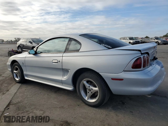 1996 Ford Mustang with VIN 1FALP4047TF106715, listed as a Copart auction lot 78658044 with 60,205 mi miles and Salvage Title. Bid and sale history available at carsss.com. Image 2.