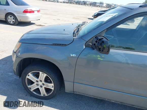2006 Suzuki Grand Vitara Luxury with VIN JS3TD947264106255, listed as a IAAI auction lot 42632638 with 268,717 mi miles and . Bid and sale history available at DreamBid. Image 12.