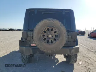 2012 Jeep Wrangler Unlimited Rubicon z VIN 1C4HJWFG9CL105047, wystawiony jako Copart lot #49494005 z przebiegiem 132 591 mil mil oraz Szkoda całkowita • Salvage title. Historia ofert i sprzedaży dostępna na DreamBid. Obrazek 6.