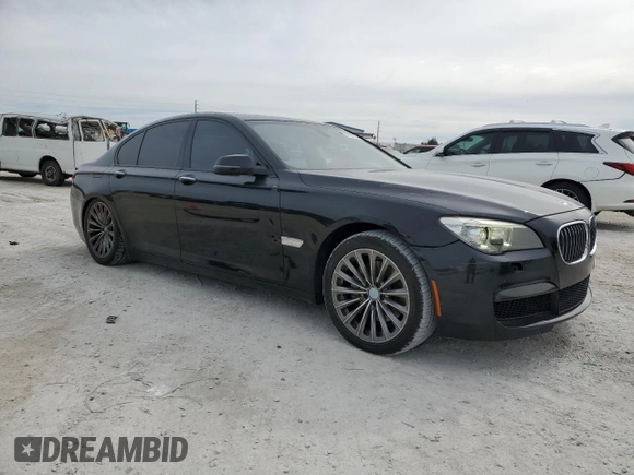 2015 BMW 7 Series 740i with VIN WBAYA6C50FD826727, listed as a Copart auction lot 82197433 with 241,799 mi miles and . Bid and sale history available at DreamBid. Image 4.