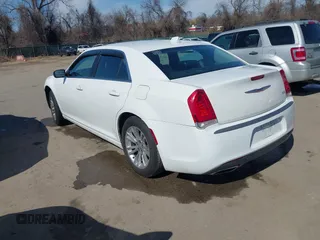 2017 Chrysler 300 Limited with VIN 2C3CCAAG1HH512125, listed as a IAAI auction lot 41677409 with 203,352 mi miles. Bid and sale history available at carsss.com. Image 3.